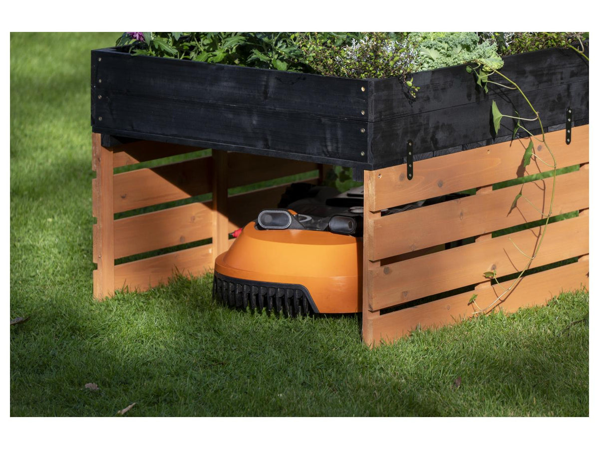Garage pour robot tondeuse avec toit à végétaliser