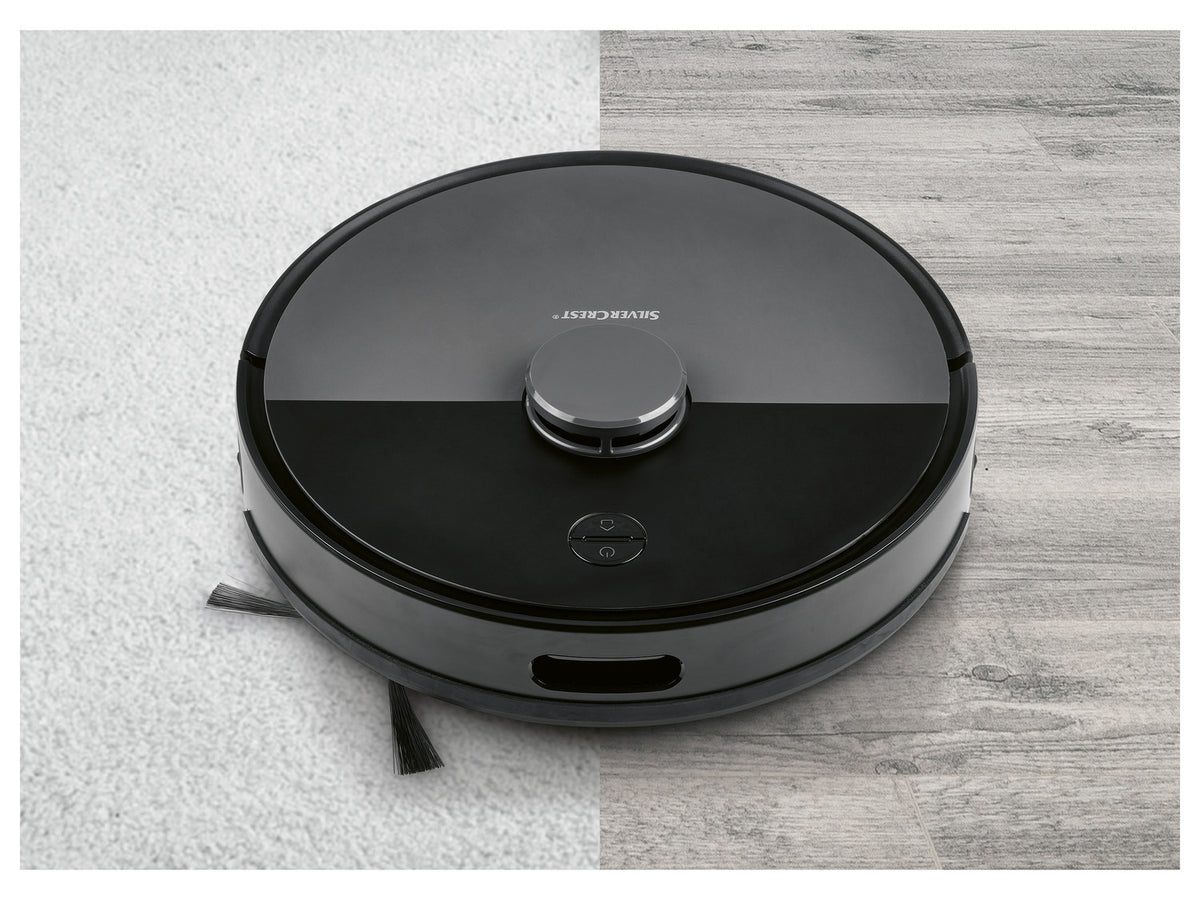 Robot aspirateur avec station d'aspiration