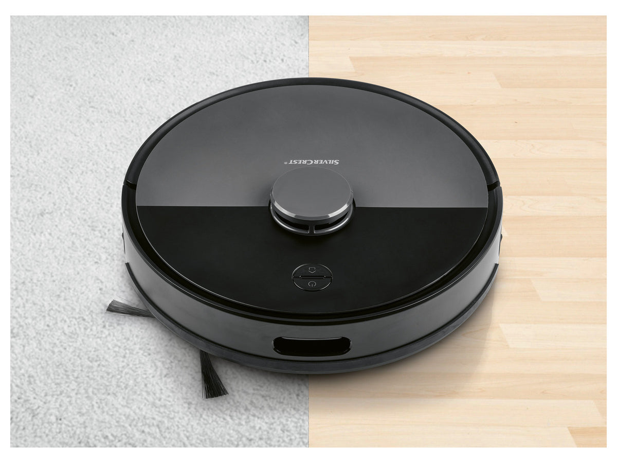 Robot aspirateur avec station d'aspiration