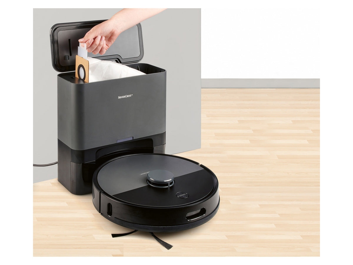 Robot aspirateur avec station d'aspiration